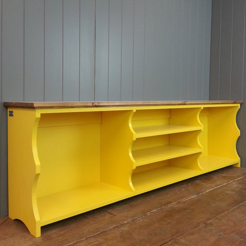 Bright yellow funky hallway fiurniture. Painted shoe and boot bench hallway seat. Large boot storage areas and shelves for storing shoes and trainers..