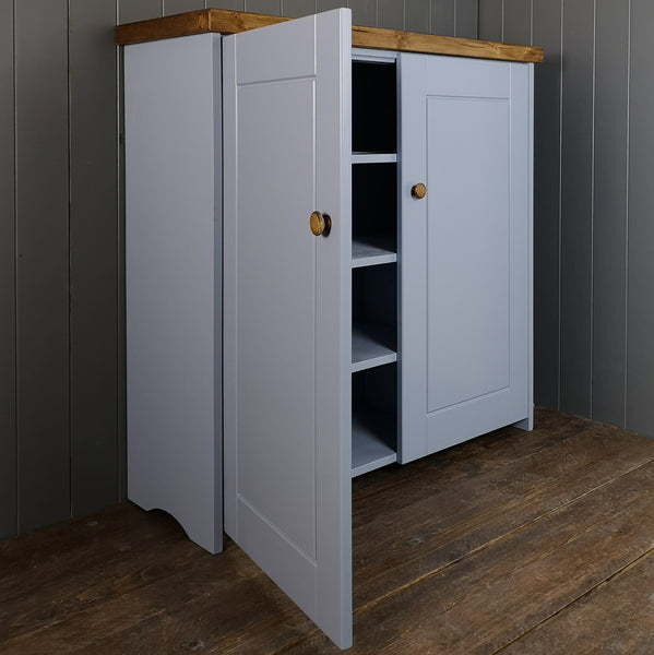 Large rustic cupboard with 4 shelves, painted blue with an antique pine top. Two soft close panel doors.