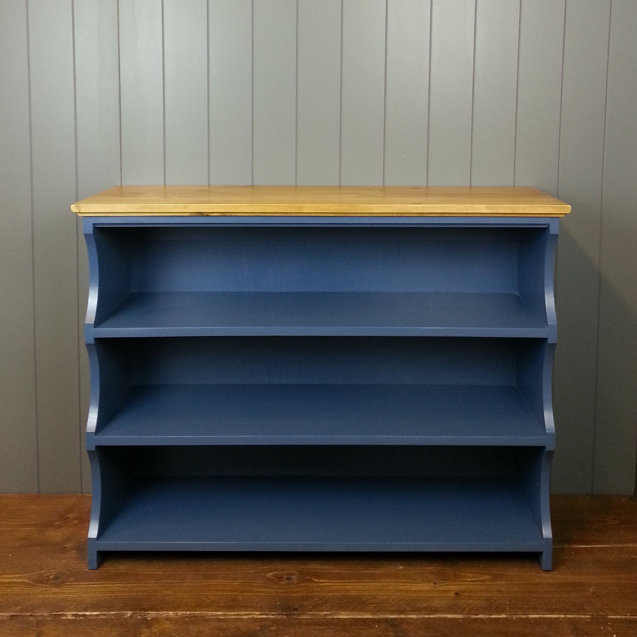 Dark blue painted hallway shoe rack with a wooden top. Hand made.