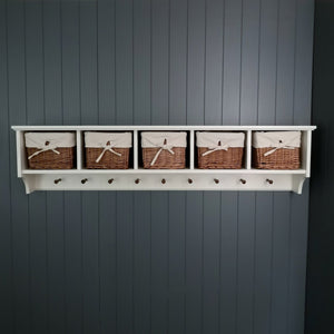Painted  hallway or utility room coat rack with coat pegs and wicker storage baskets